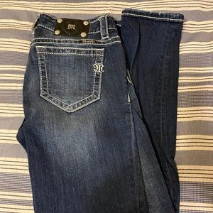 Miss Me: Mid-Rise Skinny